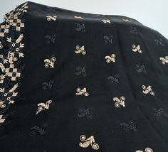 Elegant extra large embroidered shawl wrap  Beautifully made  by hand to the highest quality  Length: 186 inches Withd: 45 inches Colour: back and gold embroidery Dry clean only Embroidered Black Shawl Dupatta, Embroidered Black Dupatta Shawl, Shawl With Motifs, Black Embroidered Fabric With Motifs For Eid, Black Shawl With Intricate Embroidery In Traditional Drape, Black Wedding Shawl With Motifs, Unstitched Shawl With Motifs, Black Dupatta Shawl, Traditional Patterned Embroidered Shawl For Festivals