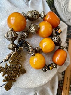 Bold Copal Amber Resien Ethiopian Cross Vintage Necklace necklace measures aprox 28 inches around Ethiopian Cross, Usa Jewelry, Charm Necklaces, Necklace Necklace, Handcrafted Necklace, Matching Earrings, Vintage Necklace, Charm Necklace, Necklace Etsy