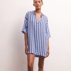 Beatrix Stripe Mini Dress Size Xs The Beatrix Stripe Mini Dress Is The Perfect Dress To Throw On And Go! Designed In Our 100% Cotton Textured Gauze With A Beachy Stripe Pattern, This Collared, Oversized Style Features A Half Button Front, Center Back Yoke, And Side Slits. Add A Belt For A More Fitted Look. Casual Striped V-neck Shirt Dress, Casual Striped Shirt Dress With V-neck, Blue V-neck Shirt Dress For Vacation, Striped V-neck Shirt Dress For Beach, Striped Short Sleeve Shirt Dress For Beach, Striped Collared Mini Dress For Summer, Blue Short Sleeve Shirt Dress For Beach, Blue V-neck Shirt Dress For Day Out, Blue Mini Shirt Dress For Vacation