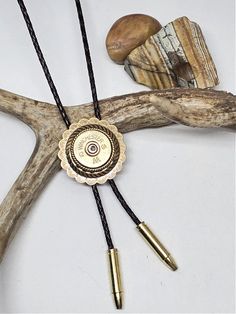 Concho 12 Gauge Shotshell Leather Bolo Tie - Unisex 12 Gauge Shotgun, Tie Collection, Western Accessories, Bullet Jewelry, Bolo Ties, 12 Gauge, Bolo Tie, Black And Brass, Braided Leather