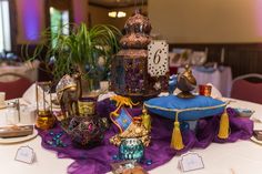 a table topped with lots of decorative items