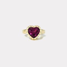 Ring crafted in 14k yellow gold with a 3.40ct heart shaped Garnet.  This ring is a size 5. This ring was handmade in Los Angeles. It is one of a kind and ready for immediate shipping. Heirloom Heart-shaped Gemstone Ring, Luxury Heart Cut Ruby Ring, Luxury Heart Cut Ring For Valentine's Day, Yellow Gold Heart Cut Ring With Center Stone, Luxury Heart-shaped Ring With Center Stone, Gold Heart Cut Ring With Bezel Setting, Heirloom Heart Cut Ring For Valentine's Day, Valentine's Day Heirloom Heart Cut Ring, Luxury Heart Cut Gemstone Heart Ring