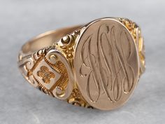 This antique Ostby Barton signet ring is stunning! Deeply carved designs along the shoulders form ornate textures, enhanced by a granulated finish that gives the 10k gold a luxurious look. We've left the original monogram – a stylish hand engraved French script! Please note that this signet ring has its original monogram, and unfortunately, this piece cannot be altered without affecting the quality of the piece. Please feel free to contact us to help you find your perfect signet ring in your sty Formal Carved Yellow Gold Signet Ring, Luxury Carved Yellow Gold Signet Ring, Antique Carved Signet Ring, Antique Carved Signet Ring For Formal Occasions, Victorian Style Signet Ring With Intricate Design, Classic Carved Signet Ring For Formal Occasions, Victorian Engraved Yellow Gold Ring For Ceremonial Occasion, Victorian Signet Ring With Intricate Design, Heirloom Carved Gold Signet Ring