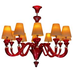 a red chandelier with six lamps on it