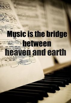 music is the bridge between heaven and earth piano keys with sheet music on them, in black and white