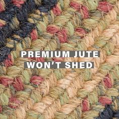 a woven rug with the words premium won't shed on it