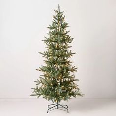 7' Pre-lit Faux Pine Christmas Tree Clear White Lights - Hearth & Hand™ With Magnolia : Target Full Christmas Tree, Christmas Tree Clear Lights, Tall Christmas Trees, Magnolia Collection, Pine Christmas Tree, Drop Lights, Tree Base, White Light Bulbs, Artificial Wreath