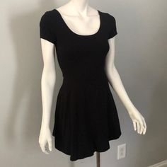 This Black Skater Dress Is Made Of A Soft Stretchy Material And Has A Very Flattering Fit And Flare Cut. Can Easily Be Dressed Up Or Down. The Perfect Little Black Dress Removed Tags But Never Wore. Nwot. Perfect Condition. Black Skater Dress, Perfect Little Black Dress, Forever 21 Dresses, 21 Dresses, Skater Dress, Stretchy Material, Cosplay Costumes, Fit And Flare, Scoop Neck