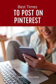 a woman using her phone while sitting in front of a laptop with the text best times to post on pinterest