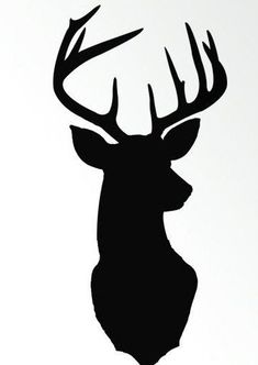 the silhouette of a deer's head is shown against a white background and has black antlers on it