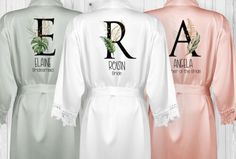 three personalized robes are shown in different colors