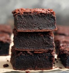 chocolate brownies stacked on top of each other