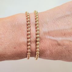 **Get Lower Prices On Our Website!! - Bochellijewelry.Com - (Not On Here On Our Own Website) ***This Is A Handmade Item And Is Stamped 14k On The Clasp*** This Listing Is For One Solid 14k 4mm Gold Bead Stretchy Bracelet 14k Solid Yellow Or Rose Gold 4mm Round Beads (2-12mm Also Avail C Shop) - White Gold Is Not Available. Clear Stretchy Cord (Search Our Shop For 4mm Listings With Clasps) Measure Your Wrist Wrist Wrist Before Ordering. Do Not Measure Your Chain Or Bead Bracelet. Follow The Instr 14k Gold-filled Yellow Gold Jubilee Beaded Bracelets, 14k Gold Yellow Rondelle Beaded Bracelets, Classic Gold Bracelets With Tiny Beads, Classic Yellow Gold Rondelle Beaded Bracelets, 14k Yellow Gold Rondelle Bracelets, Everyday Yellow Gold Bracelet With 8mm Beads, Classic 14k Yellow Gold Beaded Bracelets, Classic Gold Beaded Bracelets With Tiny Beads, Classic Gold Beaded Bracelet With Tiny Beads