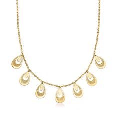 Ross-Simons - Italian 14kt Yellow Gold Filigree Teardrop Necklace. 18". Adorn your neckline with quintessential Italian style! Our gleaming 14kt yellow gold necklace features filigree teardrops in satin and polished finishes. Cable chain. Lobster clasp, 14kt yellow gold filigree teardrop necklace. Elegant Dangle Necklace With Filigree Details, Elegant Filigree Dangle Necklaces, Elegant Gold Drop Necklace Diamond Cut, Elegant Gold Drop Necklace With Diamond Cut, 14k Gold Drop Necklaces With Diamond Cut, Gold Filigree Dangle Necklaces, Gold Diamond Cut Drop Necklace Fine Jewelry, Elegant Filigree Teardrop Necklace, Gold Teardrop Necklace With Diamond Cut