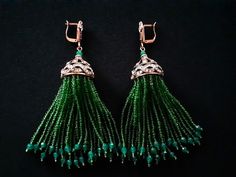 "Lovely Antique Bronze Finish Metal With Emerald Green Glass Seed Beads & Clear Crystal Rhinestone Accents Drop Dangle Tassel Leverback Earrings Bohemian Boho Style Fashion Jewelry Measure approximately 4 inches drop by 7/8 inch at the widest point. They are in excellent MINT condition with NO signs of wear, These stunning earrings are clean and ready to wear! For more beautiful and fabulous of vintage jewelry accessories please see our \"Vintage Jewelry\" Shop Section: http://www.etsy.com/shop/ Elegant Tassel Earrings With Round Dangling Beads, Elegant Latkans Earrings, Elegant Latkan Earrings With Round Beads, Elegant Green Jewelry With Tassels, Elegant Green Tassel Jewelry, Elegant Beaded Earrings With Tassels For Gift, Elegant Jewelry With Tassels And Round Beads, Elegant Gift Beaded Earrings With Tassels, Elegant Round Beaded Tassel Jewelry