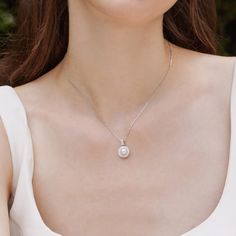 Experience Timeless Elegance with Akoya Pearls Material: Akoya Pearl, 18K white gold and diamond (S925 Silver Chain) Akoya pearl saltwater cultured pearl 1 pearl 6.5-7.0mm 21 diamonds about 0.315 carats in total Size of Pendant: 12.0*18.5 mm Handpicked of every pearl, only the top 1% of pearls are selected Handcrafted Lifetime warranty Classic Pearl Necklace With Diamond Accents For Anniversary, Classic Pearl Diamond Necklace For Formal Occasions, Classic Formal Pearl Diamond Necklace, Classic Akoya Pearl Diamond Necklace For Anniversary, Classic Diamond Necklace With Pearl Chain For Weddings, Classic Diamond Necklace With Pearl Chain For Formal Events, Classic Wedding Diamond Necklace With Pearl Chain, Pearl White Necklaces With Diamond Accents For Wedding, Elegant Hallmarked Diamond Necklace For Formal Occasions