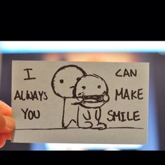 someone holding up a piece of paper that says i can always make you smile