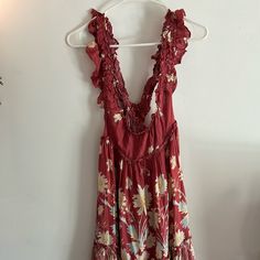 Renaissance Red Floral Dress Free People Size Medium Red Ruffled Sleeveless Sundress, Red Floral Print Midi Dress For Beach, Red Ruffled Sundress, Red Ruffled Sundress For Brunch, Holiday Sleeveless Mini Dress With Floral Print, Red Boho Dress With Floral Print For Vacation, Red Ruffled Dress For Beach, Red Ruffled Midi Dress For Day Out, Red Boho Dress With Floral Print For The Beach