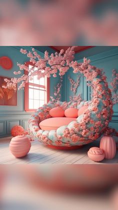 a room with pink and blue decor on the walls, an oval bed in the middle