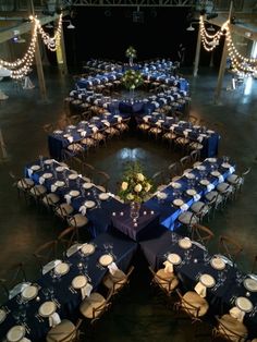 an overhead view of a banquet hall with tables and chairs set up in the center