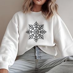 Celebrate the Holiday Season with Our Festive "Snowflake" Sweatshirt! Embrace the cozy vibes of winter and the magic of Christmas with this beautifully designed sweatshirt featuring a striking snowflake pattern. Perfect for chilly days and festive nights, this sweatshirt is a must-have for anyone who loves the winter season. Product Features: Material: Made from a premium cotton blend that is soft, warm, and perfect for keeping out the winter chill. Available Sizes: S, M, L, XL, XXL, ensuring a Snowflake Sweatshirt, Christmas Apparel, Holiday Style, Cozy Vibes, Snowflake Pattern, Cozy Christmas, Winter Casual, Holiday Fashion, Winter Wear