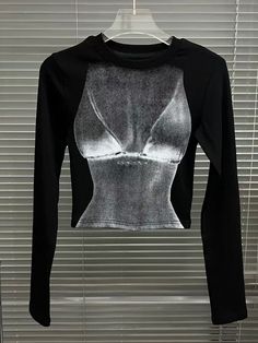 This is perfect for those who are looking for a clothing for a good price. It is fashionable, stylish, and it will look great on anyone who wears it. Do you wanahavit? Black High Stretch Crew Neck T-shirt, Trendy High Stretch Long Sleeve T-shirt, Edgy Fitted T-shirt For Fall, Edgy Fitted Fall T-shirt, Edgy Crew Neck Top With Graphic Print, Fitted Crew Neck Top With Graphic Print, Trendy Long Sleeve Tops With Graphic Print, Black High Stretch Long Sleeve Tops, Spring Stretch Top With Screen Print