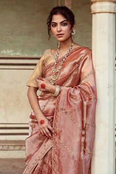 Rust saree featuring zardozi embroidery all over. Comes with a golden tissue silk blouse piece. - Aza Fashions Raw Silk Saree With Unstitched Blouse For Reception, Festive Bollywood Pre-draped Tussar Silk Saree, Transitional Dola Silk Pre-draped Saree For Reception, Festive Raw Silk Blouse Piece For Reception, Festive Embroidered Cotton Silk Pre-draped Saree, Pre-draped Saree With Cutdana For Eid, Designer Wear Pre-draped Saree With Zari Work, Festive Pre-draped Raw Silk Saree With Unstitched Blouse, Festive Silk Pre-draped Saree With Dupatta