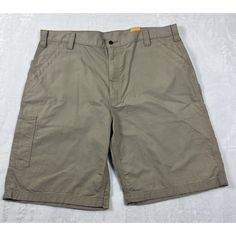 Brand: Carhartt * Loose Fit * Canvas * Utility Size: 42 Color: Tan Material: Cotton Measurements: (Laying Flat) Waist Is 21", Inseam Is 10", Rise Is 14" New Comes From A Smoke Free Home. Feel Free To Ask Questions. Thank You For Looking. Feel Free To Check Out My Other Listings. Carhartt Shorts, Men Carhartt, Work Shorts, Mens Shorts, Loose Fitting, Man Shop, Feel Free, Canvas, Color