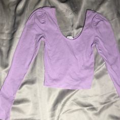 This Crop Top Was Slightly Used But I Have Only Wore It 2-3 Times Looks Brand New It Doesn’t Have The Tags Hope U Like It! Purple Stretch Long Sleeve Crop Top, Purple Long Sleeve Stretch Crop Top, Purple Stretch Crop Top, Purple Stretch Cotton Crop Top, Casual Stretch Crop Top With Puff Sleeves, Trendy Stretch Puff Sleeve Crop Top, Trendy Stretch Crop Top With Puff Sleeves, Chic Purple Long Sleeve Crop Top, Chic Long Sleeve Purple Crop Top