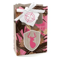 a pink gift bag with a deer on it