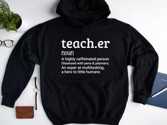 It's Teacher Appreciation Day! Show your appreciation with a gift for a teacher in your life. See our selection of sweaters and hoodies to find the perfect one to wear on this day or any day. M A T E R I A L S → Gildan® Heavy Blend™ Adult Hooded Sweatshirt → 50% Cotton / 50% Polyester → Classic Fit → Fabric 271 g/m² → Preshrunk fleece knit → Double-lined hood with colour-matched drawcord → Double-needle stitching at shoulder, armhole, neck, waistband and cuffs → Pouch pocket → 1 x 1 rib with spa Black Cotton Hoodie For Gift, Black Cotton Hoodie As Gift, Relaxed Fit Long Sleeve Hoodie As Gift, Long Sleeve Relaxed Fit Hoodie As Gift, Fall Letter Print Hoodie Gift, Fall Letter Print Hoodie As Gift, Aunt Sweatshirt, Running Hoodie, Like A Mom