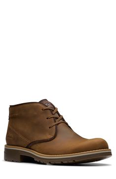 A cushioned footbed and shock absorbing outsole provide comfort with every step taken in this essential chukka boot. Leather upper/synthetic lining and sole Imported Clarks Boots, Chukka Boots Men, Chukka Boot, Mens Shoes Boots, Chukka Boots, Boots Men, Leather Boots, Nordstrom Rack, Shoes Mens