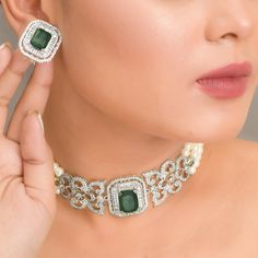 Emerald Pearl Diamond Necklace Choker featuring semi precious green cubic zirconia and diamonds.  Perfect for Indian bridal wear, this luxury necklace high-quality statement will surely enhance your look. Perfect Gift For Her. *𝐏𝐑𝐎𝐃𝐔𝐂𝐓 𝐃𝐄𝐓𝐀𝐈𝐋* * 𝐌𝐚𝐭𝐞𝐫𝐢𝐚𝐥: Brass * 𝐏𝐥𝐚𝐭𝐢𝐧𝐠: White Rhodium Plated * 𝐒𝐭𝐨𝐧𝐞: AAA-quality CZ Diamond & Emerald, Pearl. *𝐃𝐈𝐌𝐄𝐍𝐒𝐈𝐎𝐍𝐒* *𝐍𝐞𝐜𝐤𝐥𝐚𝐜𝐞* * 𝐖𝐞𝐢𝐠𝐡𝐭: 55 gm * 𝐖𝐢𝐝𝐭𝐡: 1.15 Inches * 𝐃𝐞𝐬𝐢𝐠𝐧 𝐋𝐞𝐧𝐠𝐭𝐡:  10 Exquisite Green Diamond Necklace For Formal Occasions, Elegant Green Diamond Necklace For May Birthstone, Elegant Emerald Diamond Necklace For Wedding, Exquisite Emerald Necklace With Diamond, Elegant Green Diamond Necklace With Jewels, Dazzling Green Diamond Necklaces, Exquisite Green Diamond Necklace, Dazzling Green Diamond Necklace, White Gold Emerald Diamond Necklace For Wedding