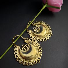 Mandala , crescent shaped earrings  Available in silver and gold polishing.. very light weight Nickle free Elegant Half Moon Metal Earrings, Gold Semi-circle Earrings For Gift, Elegant Semi-circle Metal Earrings, Elegant Gold Plug Earrings For Festivals, Gold Chandbali Hoop Earrings For Festival, Gold Bohemian Chandbalis For Pierced Ears, Handmade Semi-circle Gold Jewelry, Gold Half Moon Pierced Earrings, Elegant Crescent Brass Hoop Earrings