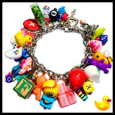 "Fun & Adorable Small Toys Charms Bracelet! SO CUTE! I make these Charm Bracelets with mini toys and charms on silver chain.  Guaranteed to make you smile! Lobster Clasp and Adjustment chain. ~7 3/4\" fit most" Junk Charm Bracelet, Junk Bracelets, Charm Bracelet Aesthetic, Cute Charm Bracelets, Charm Bracelet Ideas, Toys Food, Dope Jewelry Accessories, Custom Charm Bracelet, Mini Toys