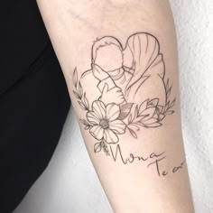 a woman's arm with a tattoo on it that says mama tea and flowers