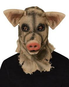 a person wearing a dog mask with hair on it's head and nose, in front of a white background