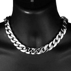 Men's 16" inch long x 18 mm wide Cuban link choker hip hop chain necklace. Plain silver tone over thick alloy metal core. Chunky cuban choker weighs a hefty 185 grams - has a premium feel. 16" inch choker is ideal for for a snug fit around neck. Chain has a plain smooth rhodium plated finish, for a dazzling shine. Stylish box clasp to lock your choker securely. Made in Korea for a solid quality chain necklace that is sure to please. 100% FREE SHIPPING in USA. Order now! Cuban Link Choker, Cuban Choker, Hip Hop Chains, Hip Hop Necklace, Metal Core, Cuban Link Chain Necklaces, Box Clasp, Link Chain Necklace, Chain Choker Necklace