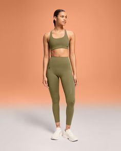 Soft, sweat-wicking, and complete with side pockets to hold your phone – these versatile tights are ideal for everyday wear. Pair them with your favorite On sneaker. A high-waisted fit means once your tights are pulled up, they actually stay up. (No adjustment-gymnastics on our watch.) The wide, smooth cut ensures a secure fit, and the longer length gives you extra coverage. The super-soft, full-length Movement Tights are your perfect partner whether hiking, working on your practice, or just rel Versatile Nylon Sports Tights, Green 4-way Stretch Sporty Tights, Sporty Green Tights With 4-way Stretch, Nylon Athleisure Tights With Go-dry Technology, Compressive Versatile Sports Tights, Versatile Sports Tights With Light Support, Functional Nylon Yoga Pants, Light Support Athleisure Tights For Gym, Versatile Compressive Sports Tights