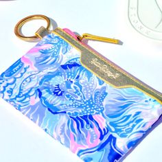 Brand New. Never Used. Still In Packaging. Another Tried And True Travel Must-Have, This Lilly Pulitzer Id Case Is The Best Way To Keep Your Cards Safe Whether You're On The Road Or In The Air. Dimensions: 3.25" X 5.25" Materials: Polyester/Twill Material, Leatherette Trim, Zipper Closure, Gold Metal O-Ring Trendy Blue Coin Purse For Travel, Travel Must Haves, O Ring, Lilly Pulitzer, Gold Metal, Women Shopping, Gold, Color