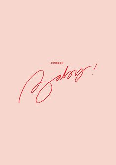 the word bado written in red ink on a pink background