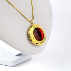 Beautiful resin locket necklace with bright colors. This locket is created using high-quality French resin and stain glass paints. The length of the pendant is about 1.25 inches (3.5 cm). The chain is brass with an anti-allergenic gold color coating. The length is 18 inches (46 cm). Worldwide shipping! ♥ Gift messages and gift packing Feel free to include a gift message and put it in the direct address of the receiver. We ship without a receipt and no unnecessary information will be spoiled. Add Handmade Red Jewelry For Birthday Gift, Handmade Red Necklaces For Birthday, Red Jewelry For Valentine's Day Keepsake, Handmade Red Necklace For Birthday, Personalized Red Jewelry For Keepsake, Red Locket Pendant Jewelry, Personalized Red Keepsake Jewelry, Red Locket Jewelry With Round Pendant, Red Pendant Necklace For Keepsake