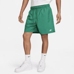 Sporty and versatile, these woven shorts are made for easygoing daily comfort. The fit is designed to hit above-the-knee and feel relaxed through the seat and thighs to keep them from feeling restrictive, especially in warmer weather. Mesh lining helps you stay cool and comfy around town. Pair them up with a tee and your favorite Nike sneakers for a look that gets you out there looking and feeling great. Summer Sportswear Shorts For Outdoor Activities, Nike Green Bottoms For Outdoor Activities, Nike Green Bottoms For Outdoor, Casual Bermuda Moisture-wicking Shorts, Casual Bermuda Shorts With Moisture-wicking, Nike Relaxed Fit Athletic Shorts For Summer, Nike Shorts For Outdoor Activities, Nike Moisture-wicking Shorts For Summer, Nike Summer Shorts With Moisture-wicking