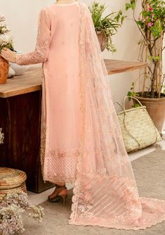 Introducing our Luxury Wedding Collection by Ramsha to make you look and feel your best These pieces will add a touch of class and elegance to your wardrobe. This collection is a beautiful collection of ensembles offering versatile compositions for the latest festive wardrobe requirements. Embroidered handmade front Embroidered back with sequence Embroidered handmade sleeve with sequence Embroidered handmade patch for daman Embroidered Dupatta with sequence Raw silk for lining Raw silk trouser Color: There might be slight color variation due to lighting and flashes during the photo shoot. The color may also vary because of different screen resolutions. Wash Care: Dry Clean Only. Batik Print Dress, Lehenga Jewellery, Saree Sale, Handmade Patch, Organza Top, Lehenga Style, Lawn Dress, Jamdani Saree, Embroidered Dupatta