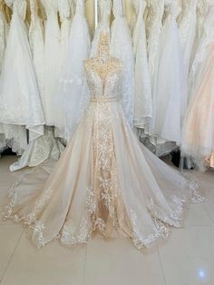 wedding gowns on display in a bridal shop