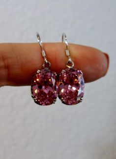 Pink Cubic Zirconia (CZ) Solid Sterling Silver Earrings Edward Design#E70 This is a pair of antique-inspired Edwardian style earrings. The flawless oval pink Cubic Zirconia (CZ) gems are surrounded by delicate sterling silver filigree. The lovely full cut oval stones are approximately 14mm by 10mm in length & width. The earrings are 1.25 inches long and are marked 925 for solid sterling silver. Notice the beautiful floral craftsmanship of the filigree settings. These amazing earrings are pur Hot Pink Earrings, Art Deco Filigree, Edwardian Art, Edwardian Jewelry, Nouveau Art, Pink Gem, Cubic Zirconia Earrings, Sterling Silver Filigree, Antique Inspiration