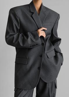 Color: Grey/White Pinstripe Midweight traditional suiting fabric Oversized fit Notch lapels Padded shoulders Button cuffs Single welt breast pocket Front illusion flap pockets Front button closure Lined 75% Polyester 25% Rayon Dry Clean By The Frankie Shop. Imported Fits Inspiration, Woman Suit, The Frankie Shop, Suiting Fabric, Frankie Shop, Everyday Fashion Outfits, Woman Suit Fashion, Gray Suit, Suit Fashion