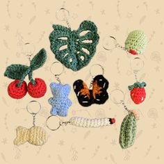 crochet keychains with fruits and vegetables on them are arranged in a circle