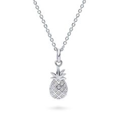 This petite minimalist pineapple pendant necklace is a fun and playful way to boast your chic tastefulness and is just as comfortable as it is adorable. Crafted with sterling silver, rhodium plated, stamped 925, nickel free. Set with premium quality 0.1 carat total (1mm) round cubic zirconia in prong setting. Adjustable chain measures 16"-18" in length. Pendant measures 0.75" (L), 0.28" (W). Lobster claw clasp. Filigree Pendant Necklace, Filigree Necklaces, Fashion Pendant, Cz Necklace, Flower Pendant Necklace, Cz Pendant, Sterling Silver Flowers, Inspired Jewelry, Circle Pendant