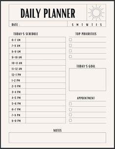 the daily planner is shown in black and white, with an orange sun on it